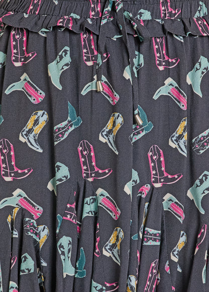 Black Panhandle Slim skirt with cowboy boot pattern 