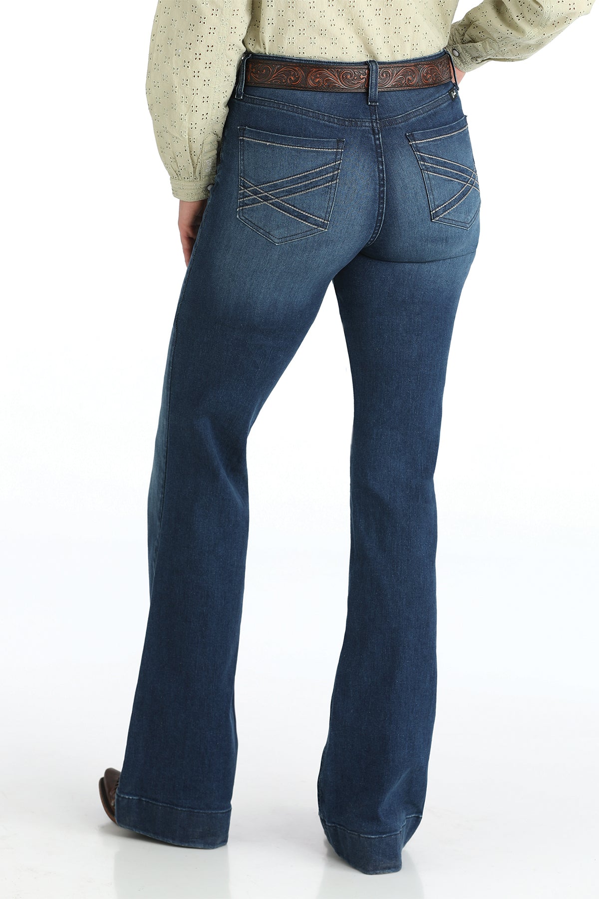 Cruel Denim trouser blue jeans worn by a person on a white background