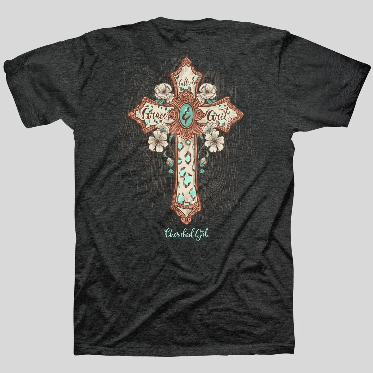 A dark heather gray t-shirt featuring a large graphic on the back with a decorative cross adorned with white roses, turquoise accents, and the words  Cherished Girl