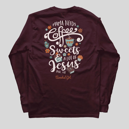 A long-sleeve maroon crewneck shirt from Cherished Girl shown from the back, featuring a large graphic print with the text 'MAMA NEEDS Coffee Sweets & A LOT OF Jesus PHIL. 4:3' in white script, decorated with coffee cups, flowers, and a small book illustration.