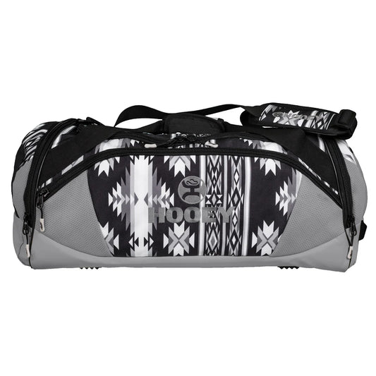 Gray and black duffel bag with aztec pattern and 'Hooley' branding on a white background