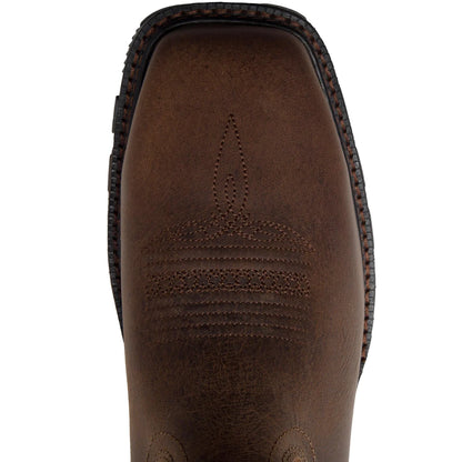 Close-up of a brown leather Durango boot with stitching detail on a white background
