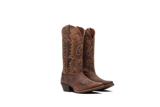 Pair of brown Durango cowboy boots with intricate designs on a white background