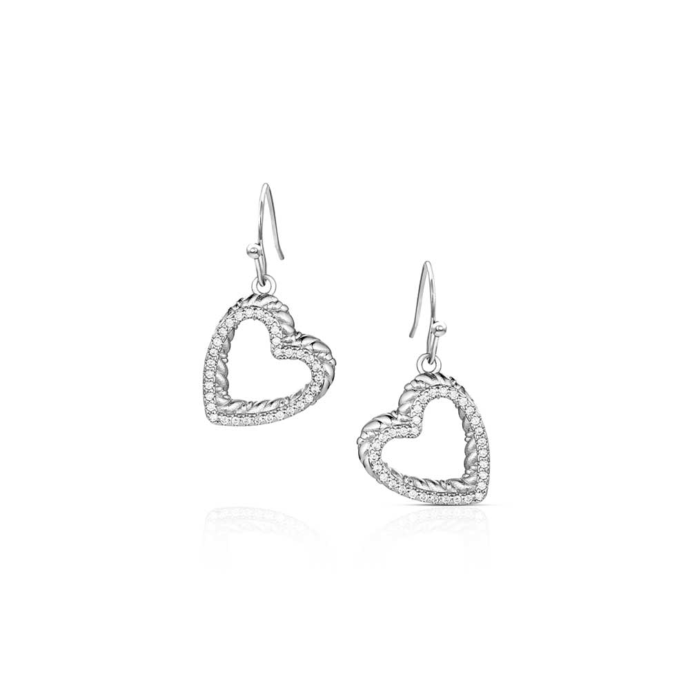 Heart-shaped Montana Silversmiths silver earrings on a white background