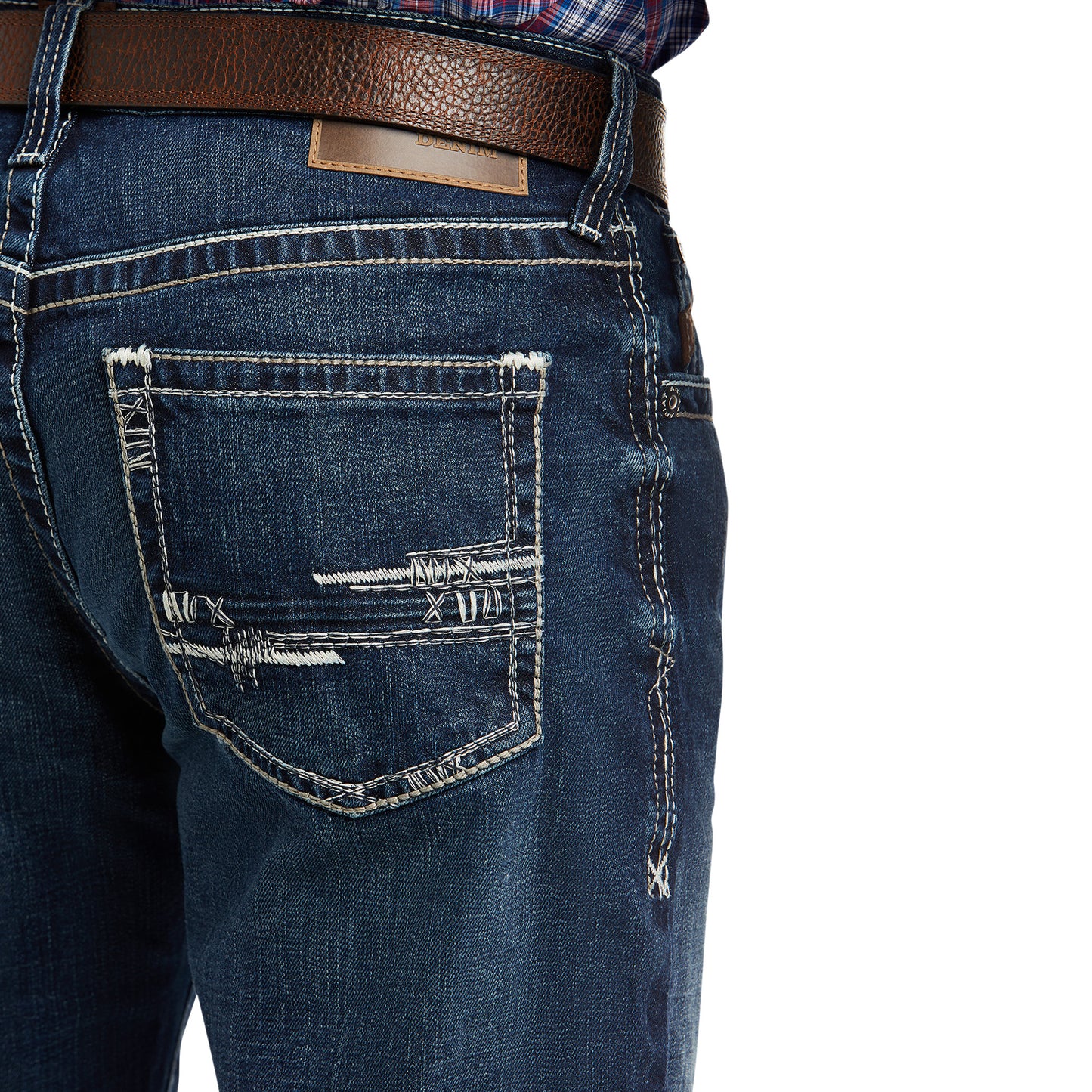 demin Ariat jeans with a brown belt on a white background