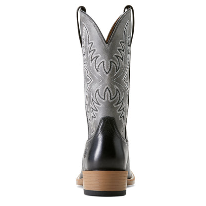 the back of a black and grey cowboy boot