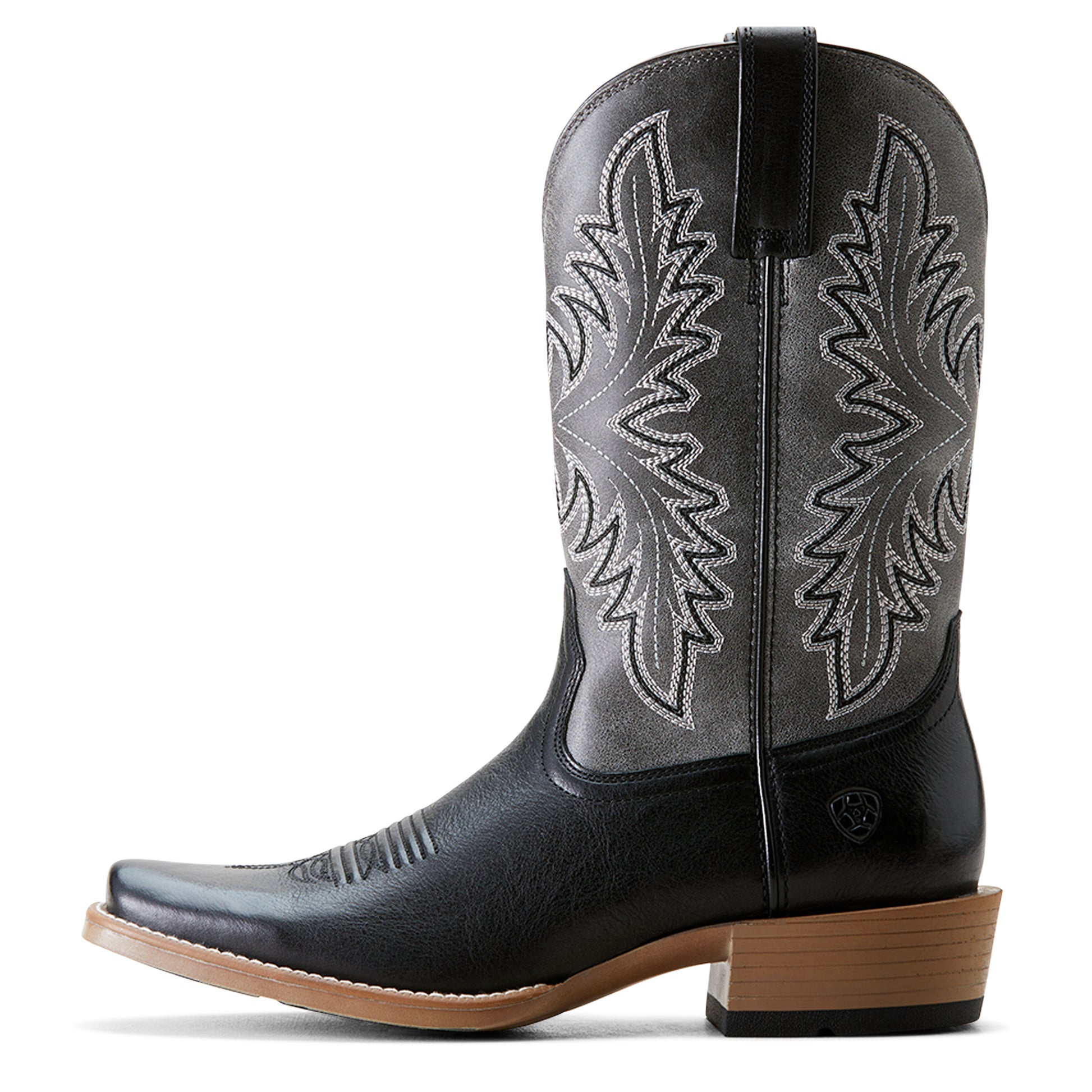 a black and grey cowboy boot by ariat on a white background