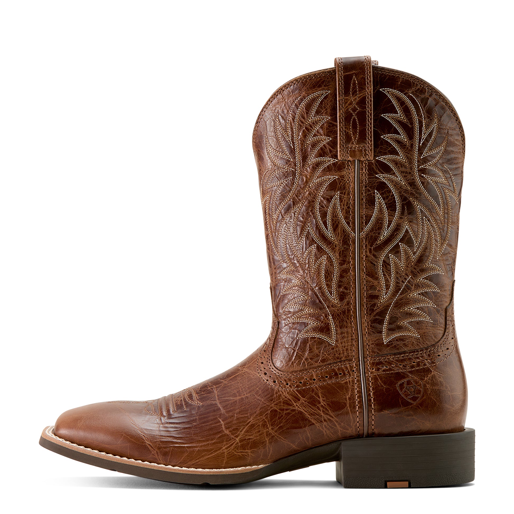 Brown 'Ariat' cowboy boot with intricate embossing on a white background