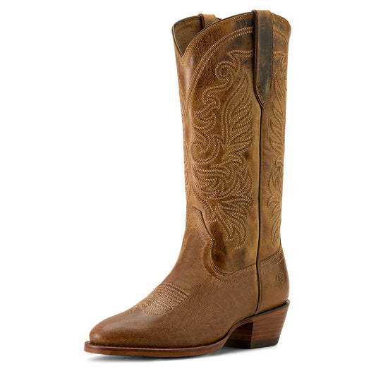 Brown cowboy boot with intricate stitching on a white background