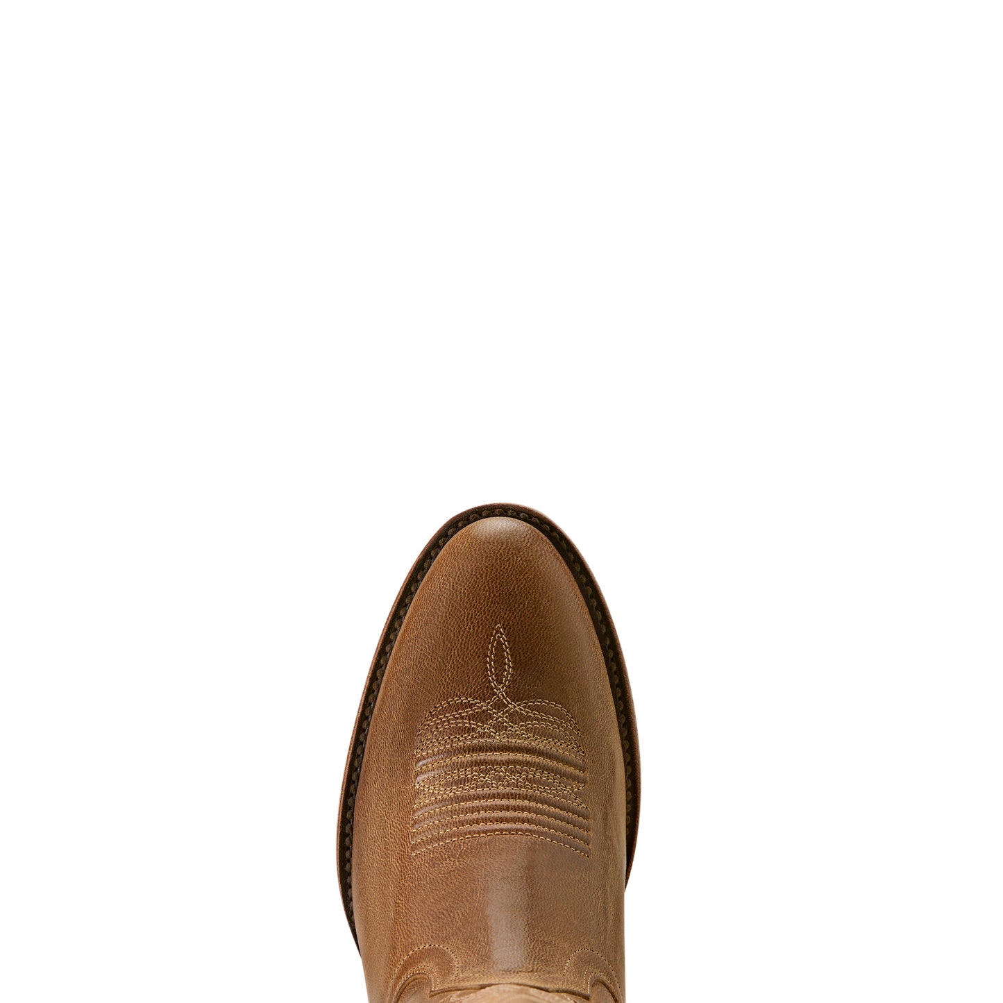 Tan cowboy boot toe with detailed stitching on a white background