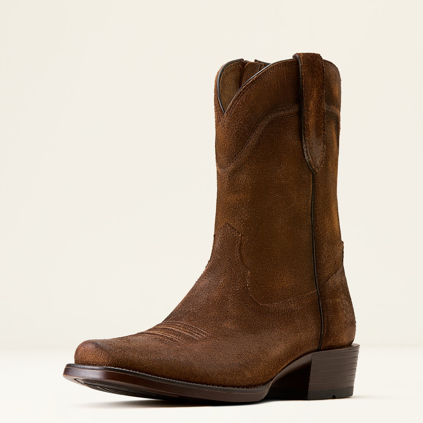 a brown suede cowboy boot with a narrow square toe by ariat