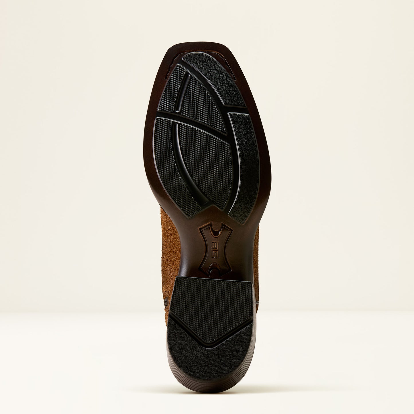the outsole of a cowboy boot by ariat that is black