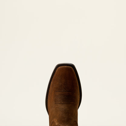 a close up of a suede narrow square toe cowboy boot