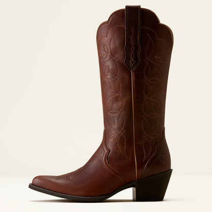 Brown cowboy boot with intricate design on a white background