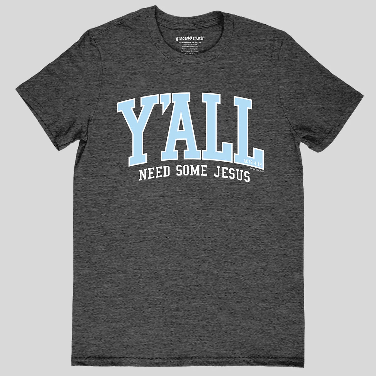 A dark heather gray t-shirt from Grace & Truth with a graphic on the chest that reads 'Y'ALL NEED SOME JESUS' in light blue and white text, shown against a solid light gray background.