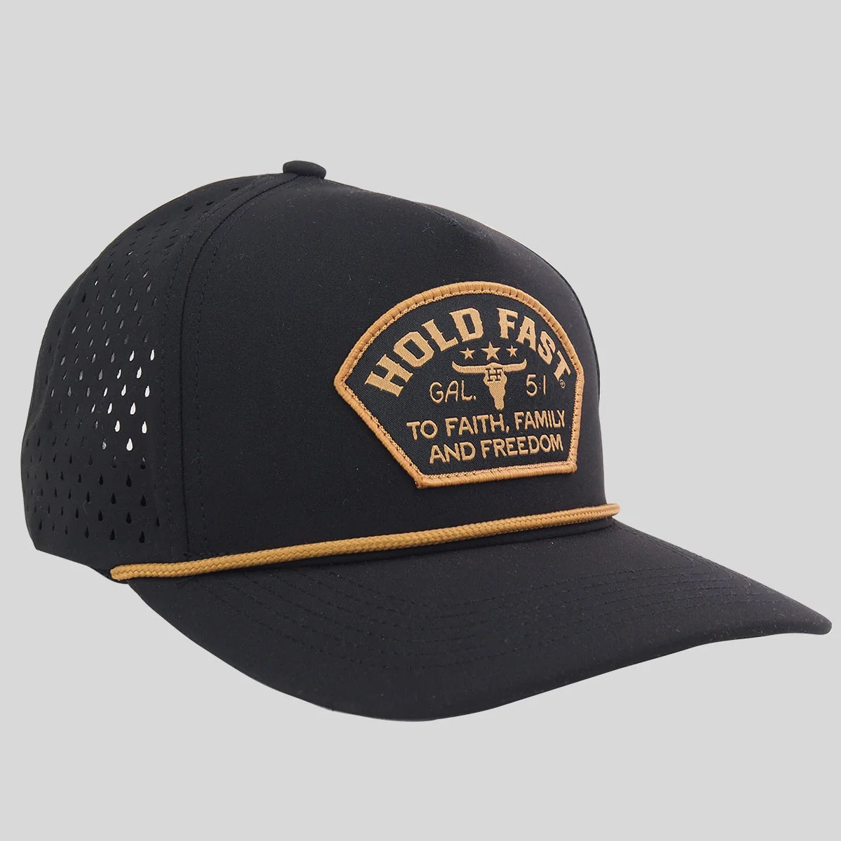 Black trucker-style cap from Hold Fast with perforated side panels, a curved brim, and a tan embroidered front patch reading “HOLD FAST GAL. 51 TO FAITH, FAMILY AND FREEDOM,” shown on a light gray background.