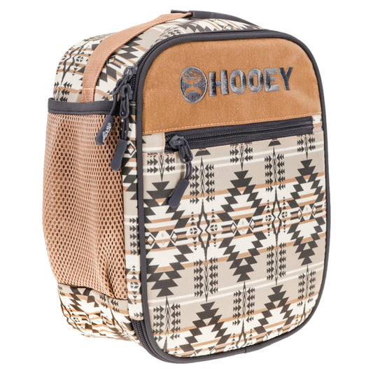 A HOOELY brand lunch bag featuring a Southwestern geometric pattern in beige, black, and brown, with a tan suede-like top panel and a side mesh pocket.