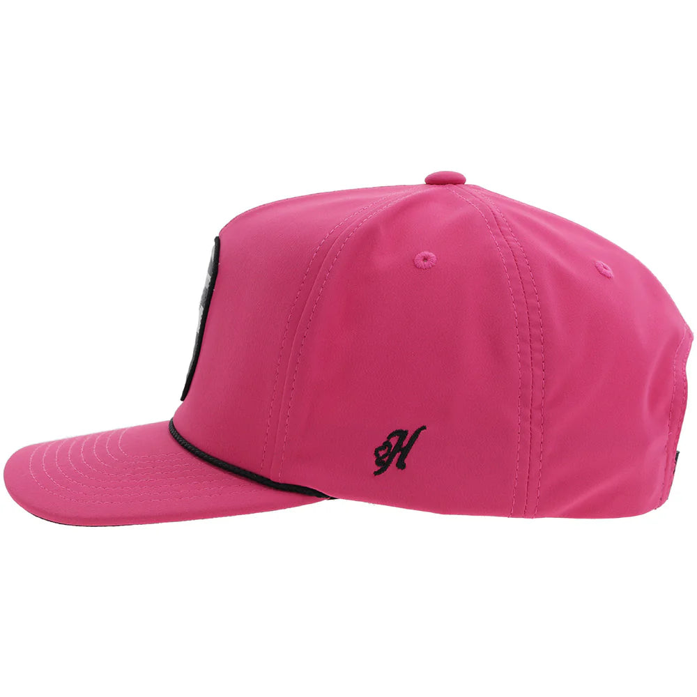 a pink hooey cap with black accents and a patch with a bucking horse that says 'hooey'