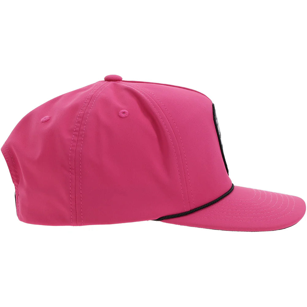a pink hooey cap with black accents and a patch with a bucking horse that says 'hooey'