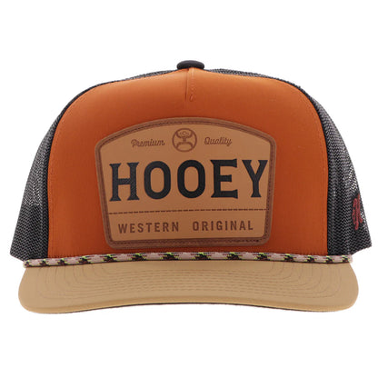 Orange and black trucker hat with 'HOOEY' logo on a white background