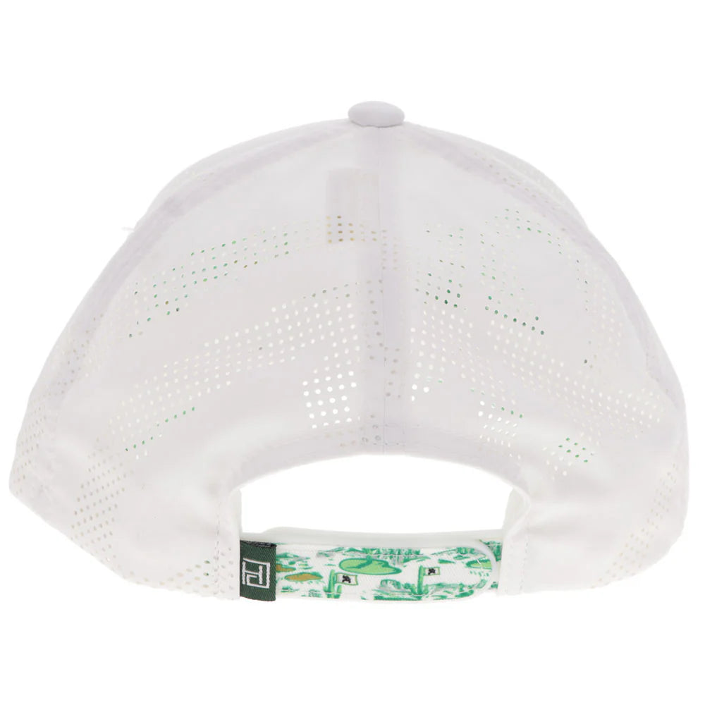 the back of a white cap with laser print mesh and a green pattern on the snap strap