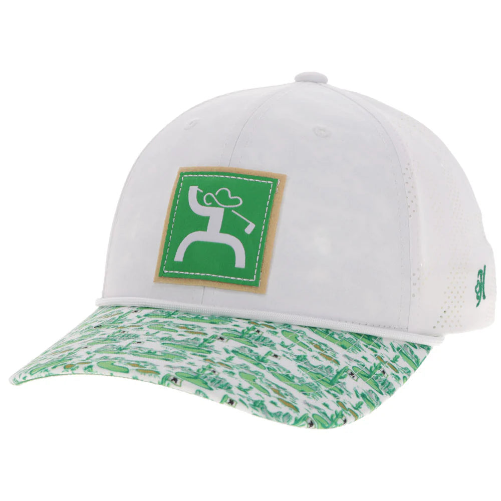 a white and green cap with a golfing figure on a patch with a pattern on the bill 
