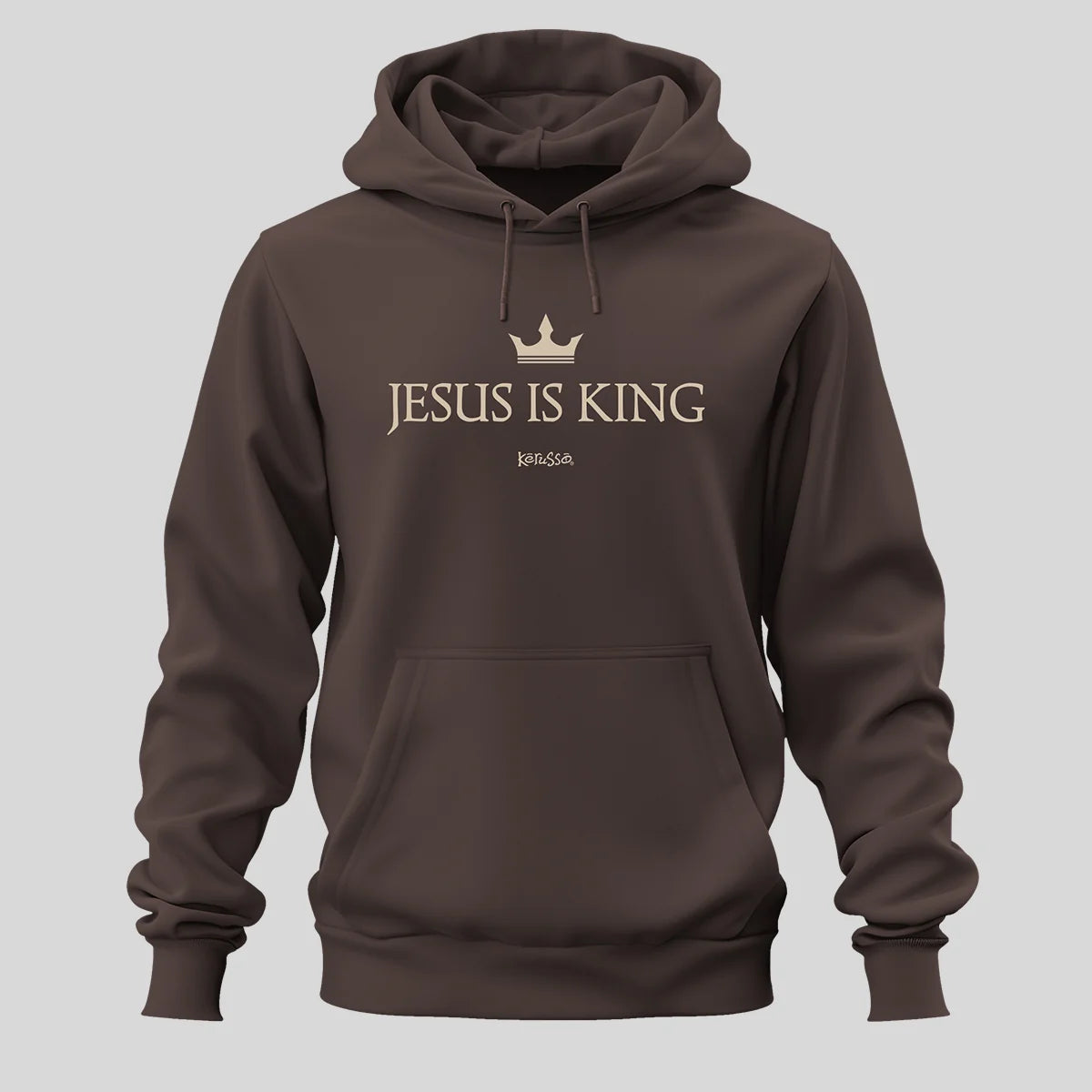 A dark brown pullover hoodie from Kerusso with a front kangaroo pocket and drawstring hood, featuring a gold crown graphic and the text 'JESUS IS KING' set against a solid light gray background.