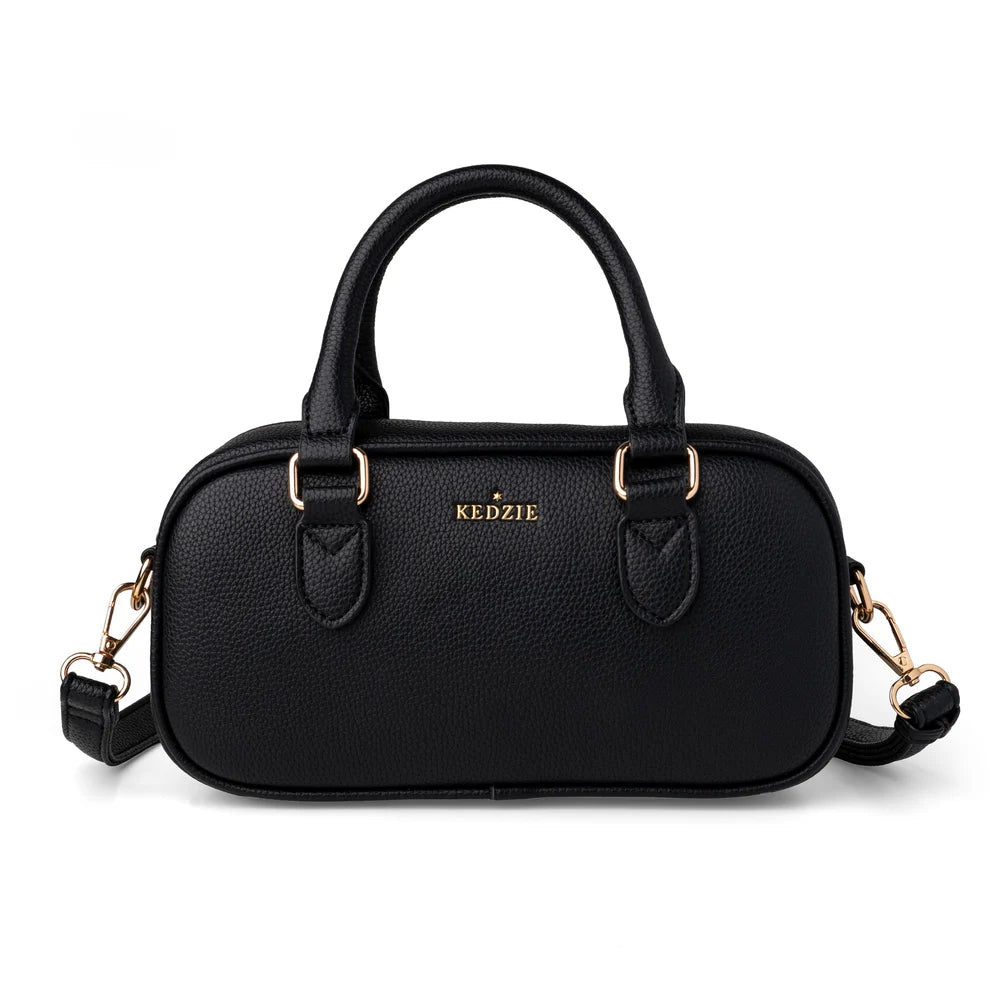 Black crossbody bag from Kedzie with removable strap and tote handles on a white background