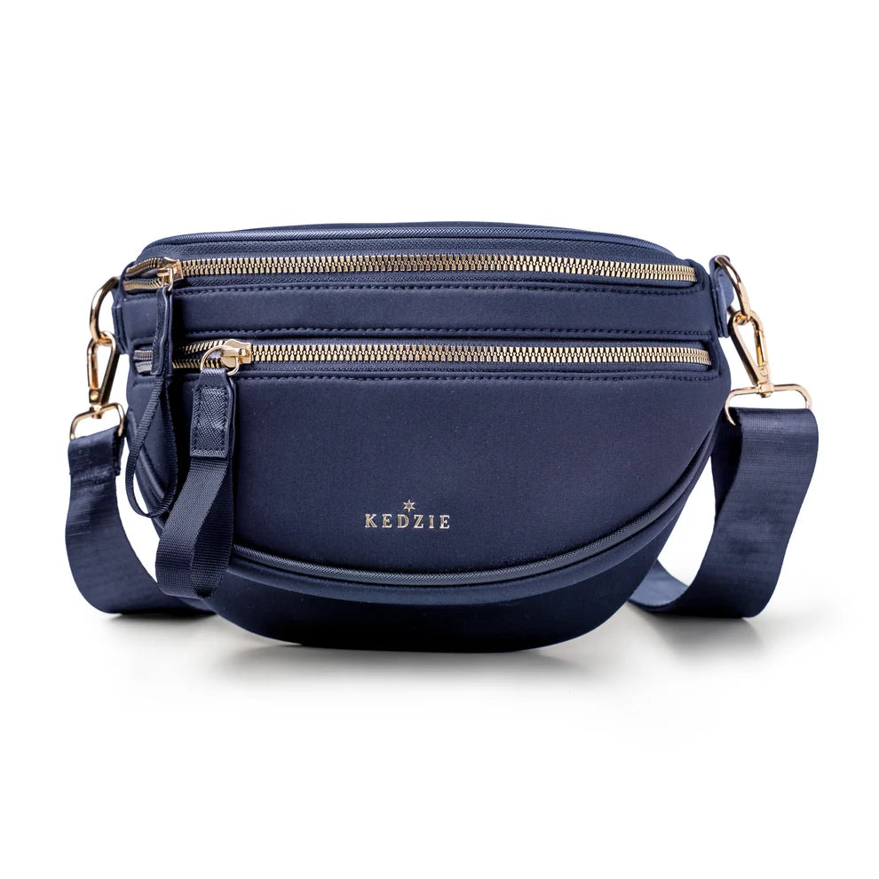 Blue crossbody bag by Kedzie on a white background