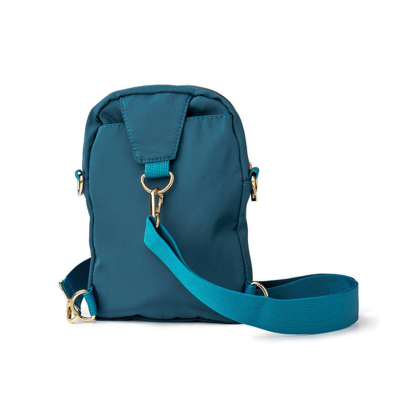 Blue Kedzie bag with a strap on a white background