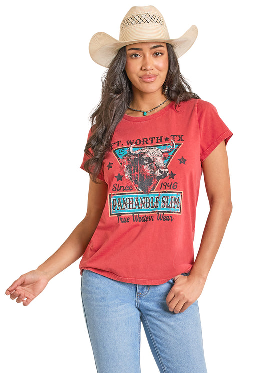 woman wearing a red printed Panhandle Slim tshirt, blue jeans and a cowboy hat on a white background
