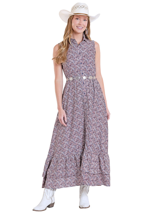 girl wearing a floral Panhandle Slim dreess, cowboy boots and hat on a white background