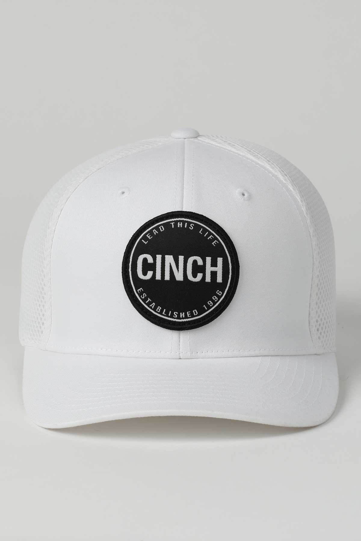 White cap with Cinch logo on a light gray background