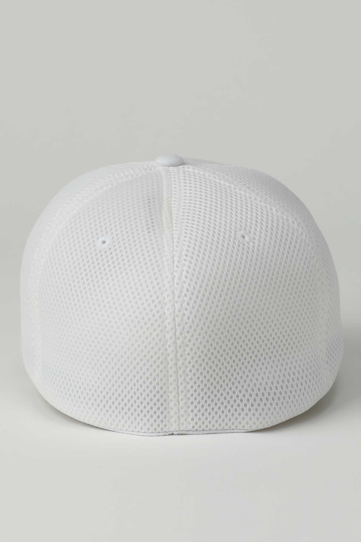 White textured cap on a light gray background