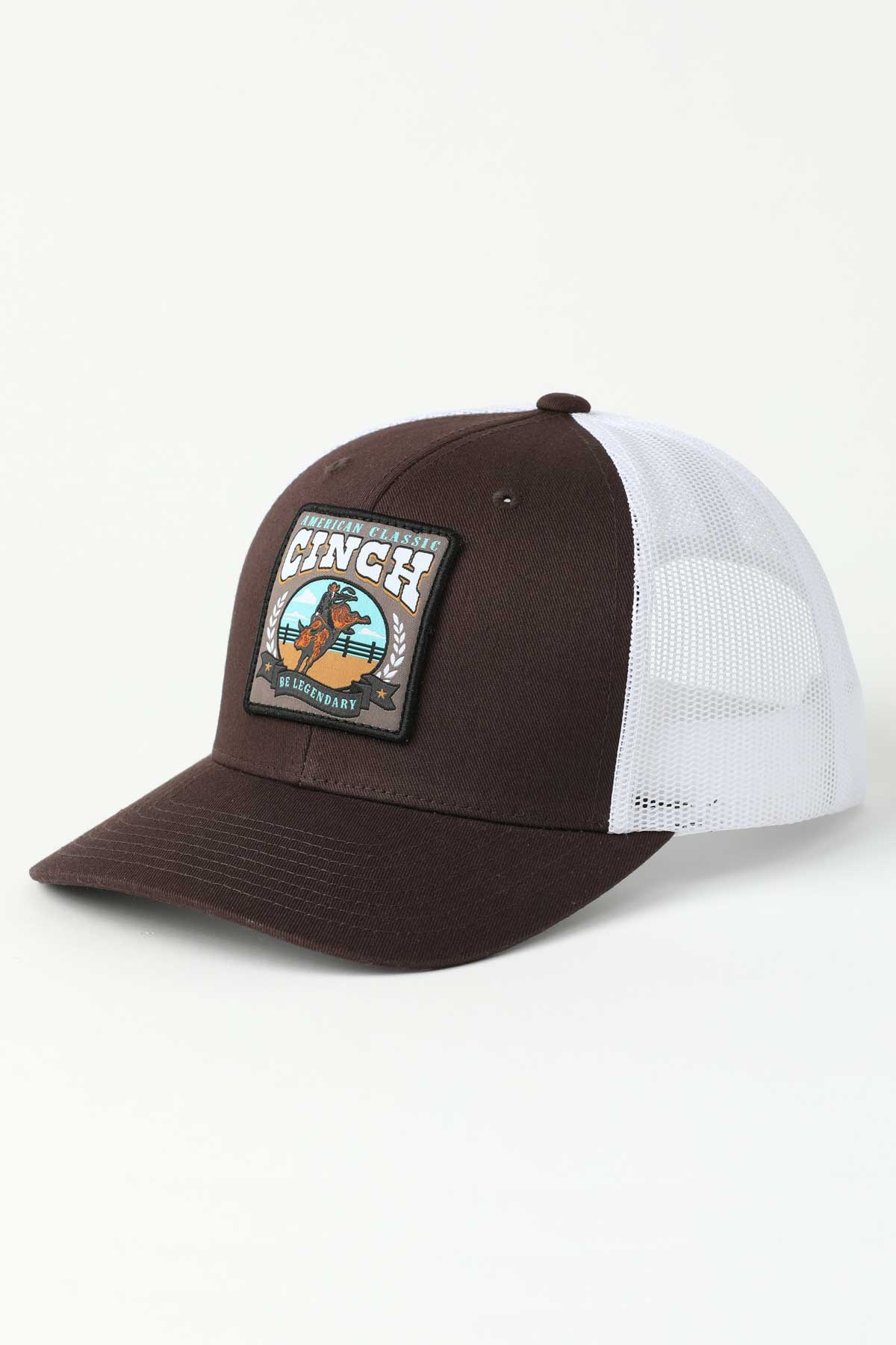 Brown and white 'Cinch' cap with a patch on a light gray background