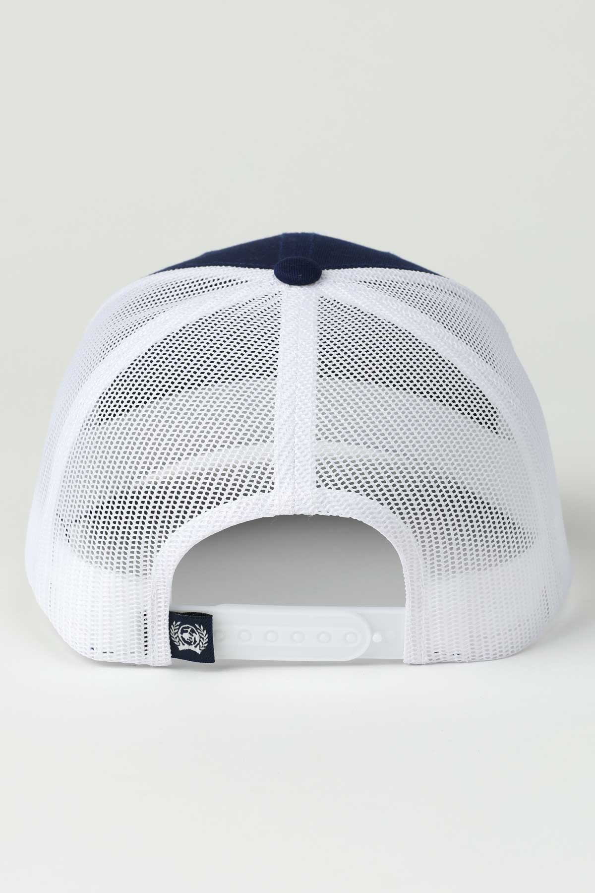 White mesh cap with navy blue visor on a light gray background