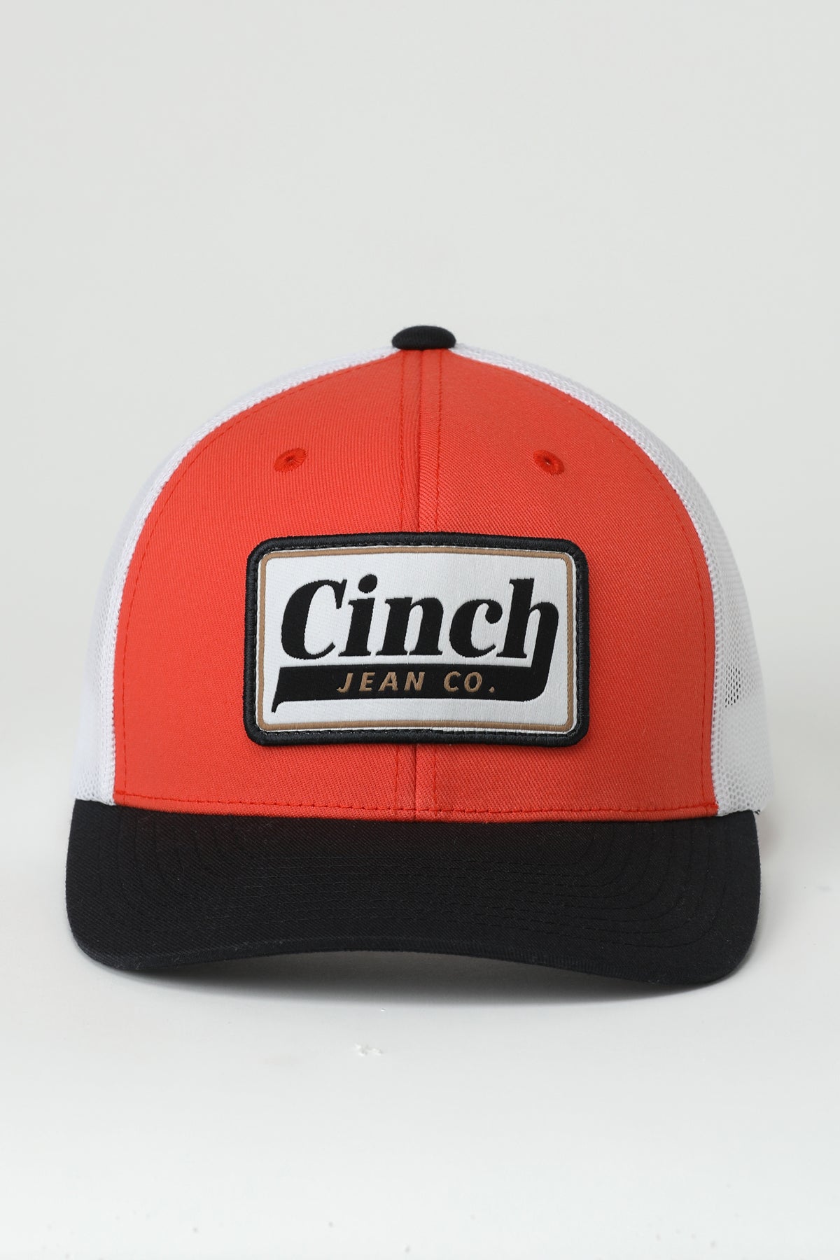 Orange and Black Cinch ball cap on a white background
