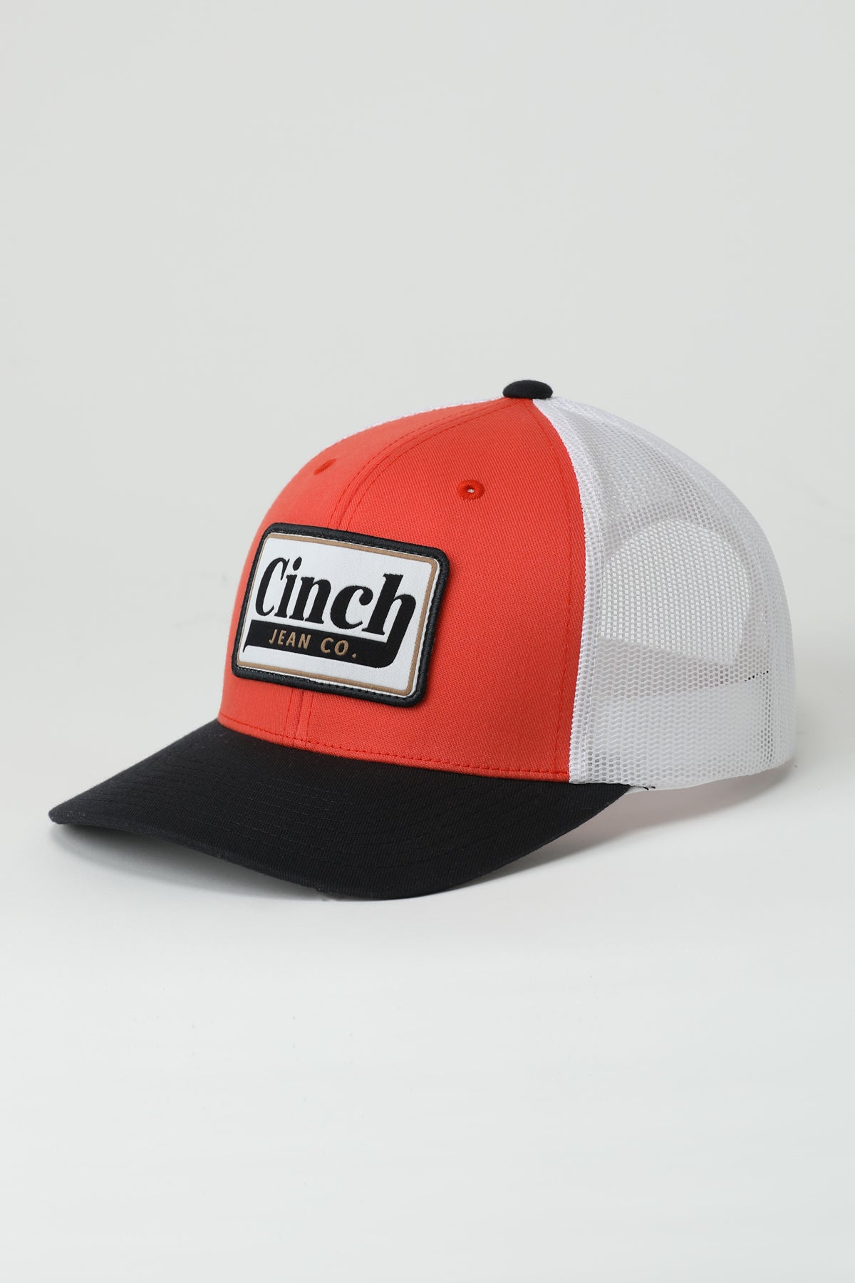 Orange and Black Cinch ball cap on a white background