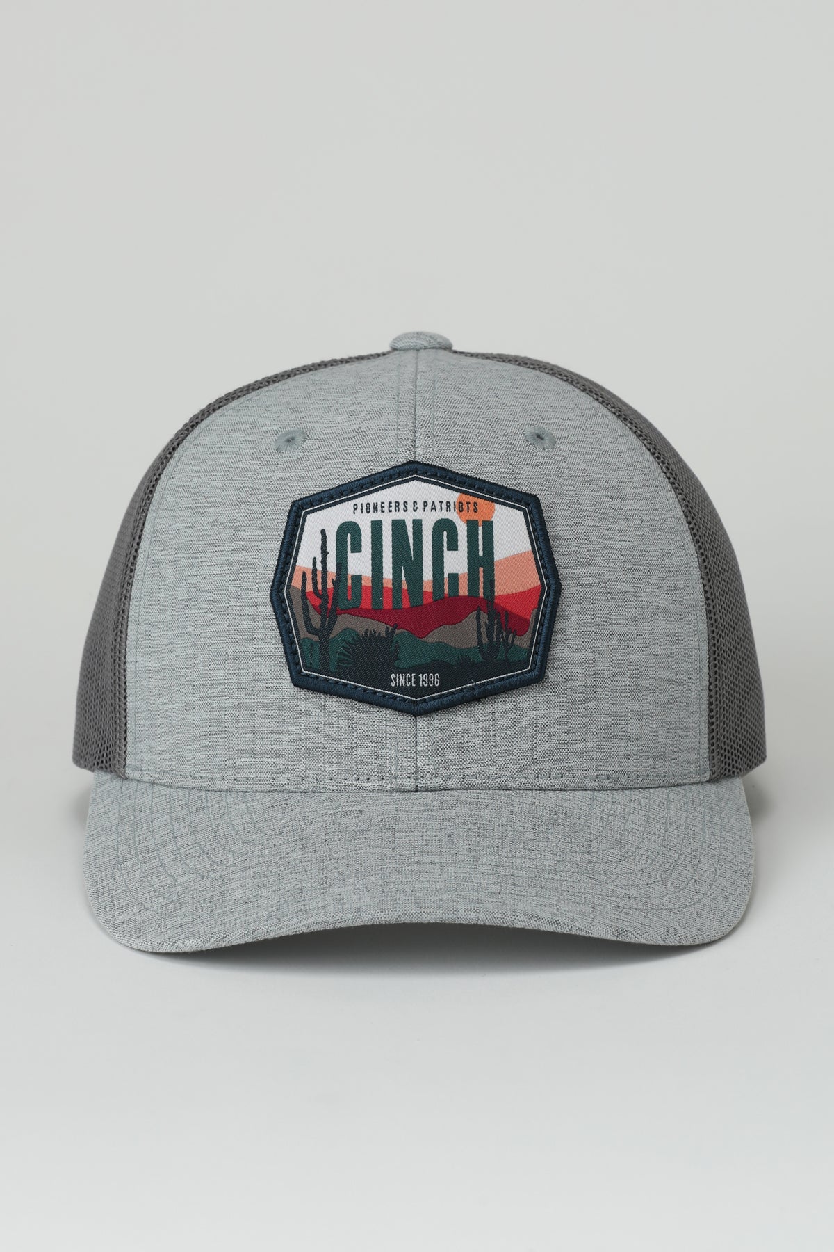 Gray cap with a Cinch logo on a light gray background