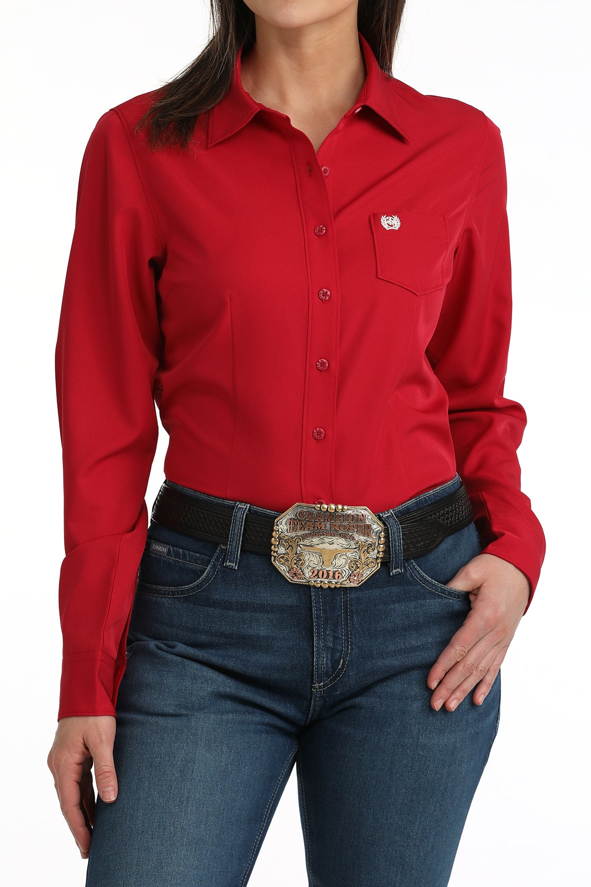 Pink women's cinch shirt worn by a person on a white background