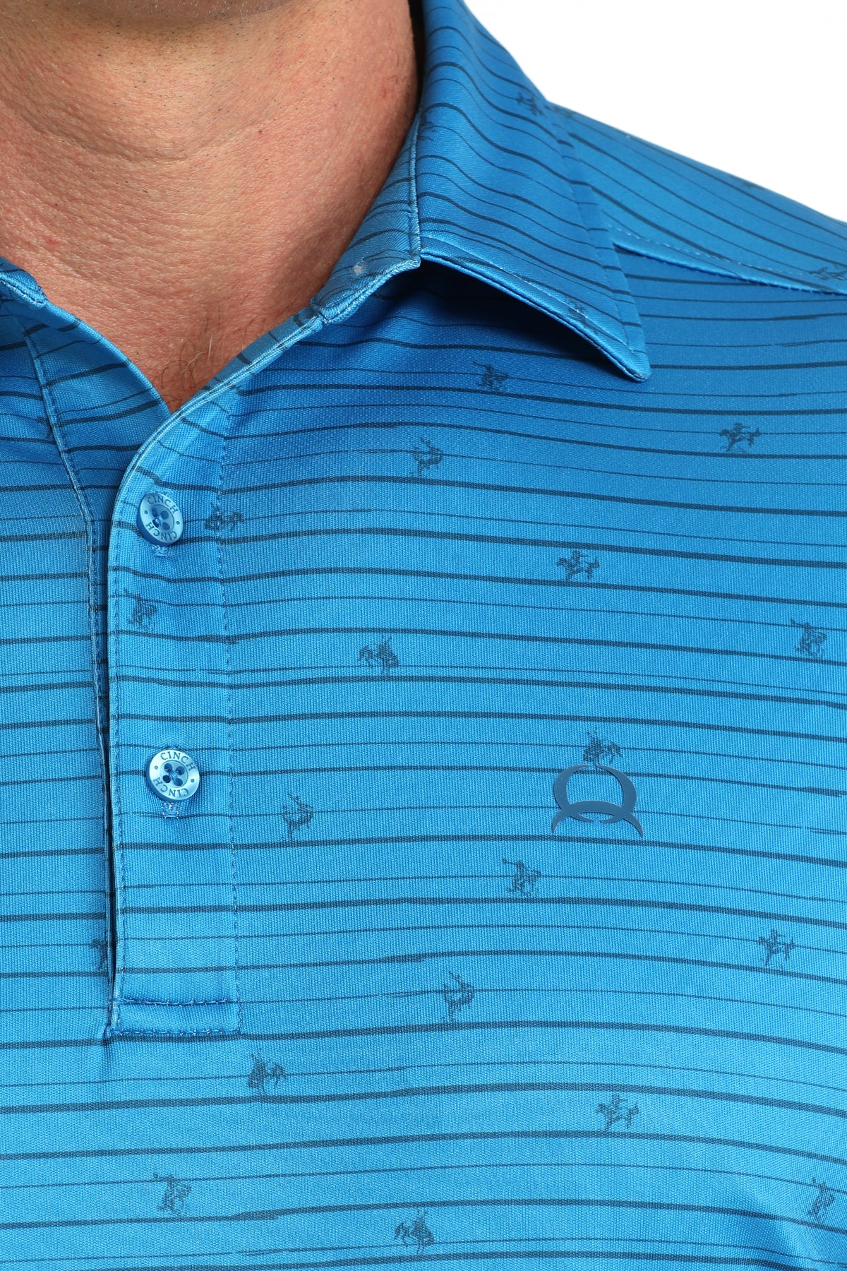 man wearing a Blue Cinch shirt on a white background