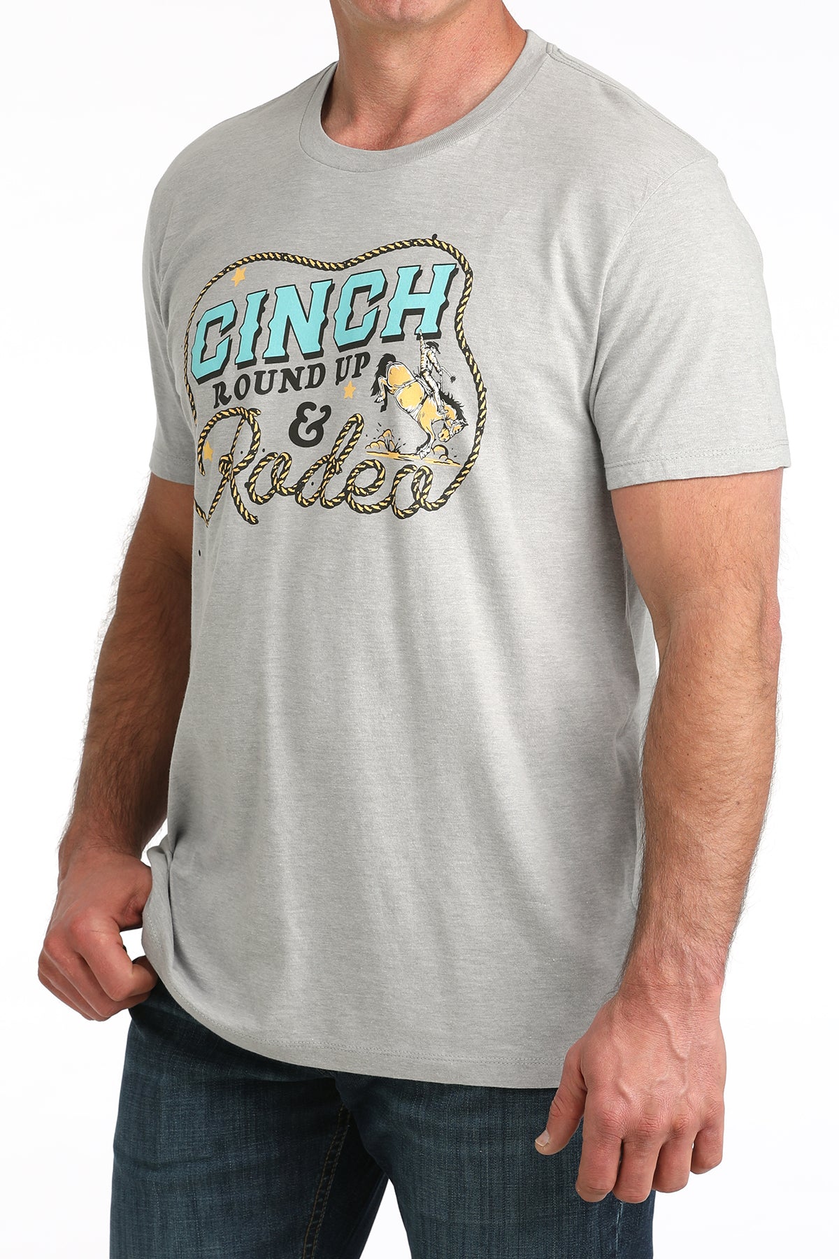 Gray t-shirt with 'Cinch Round Up & Rodeo' graphic on a white background