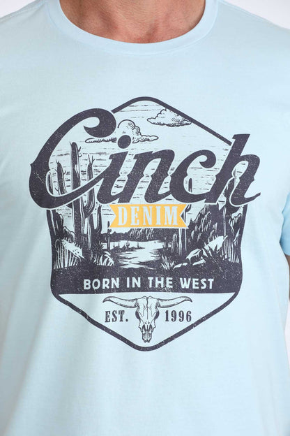 Light blue t-shirt with 'Clinch' graphic design featuring a desert landscape and text.