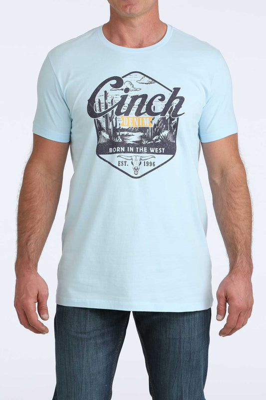 Light blue cinch t-shirt with graphic design and text worn by a person on a white background