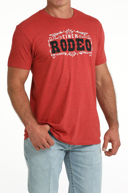 men wearing a red Cinch rodeo Shirt with blue jeans on a white background