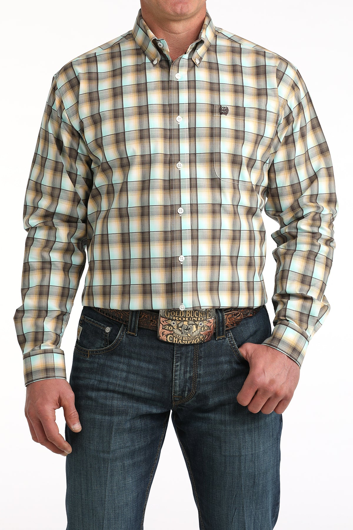 Man wearing a plaid 'Cinch' shirt and jeans with a white background