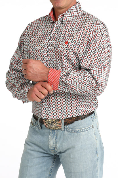 man wearing a grey and red Cinch shirt and blue jeans on a white background