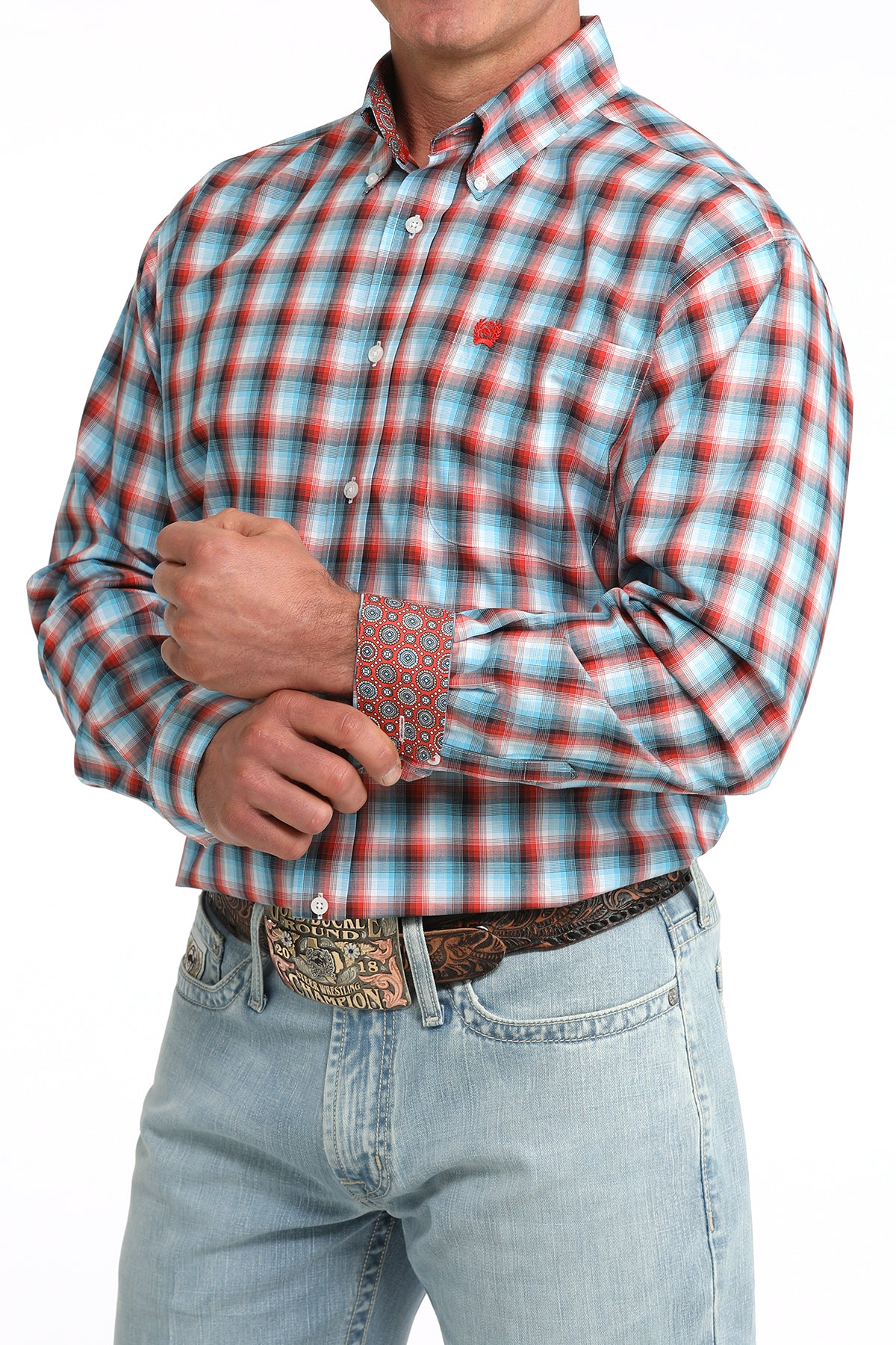 Man wearing a Cinch plaid shirt and jeans on a white background