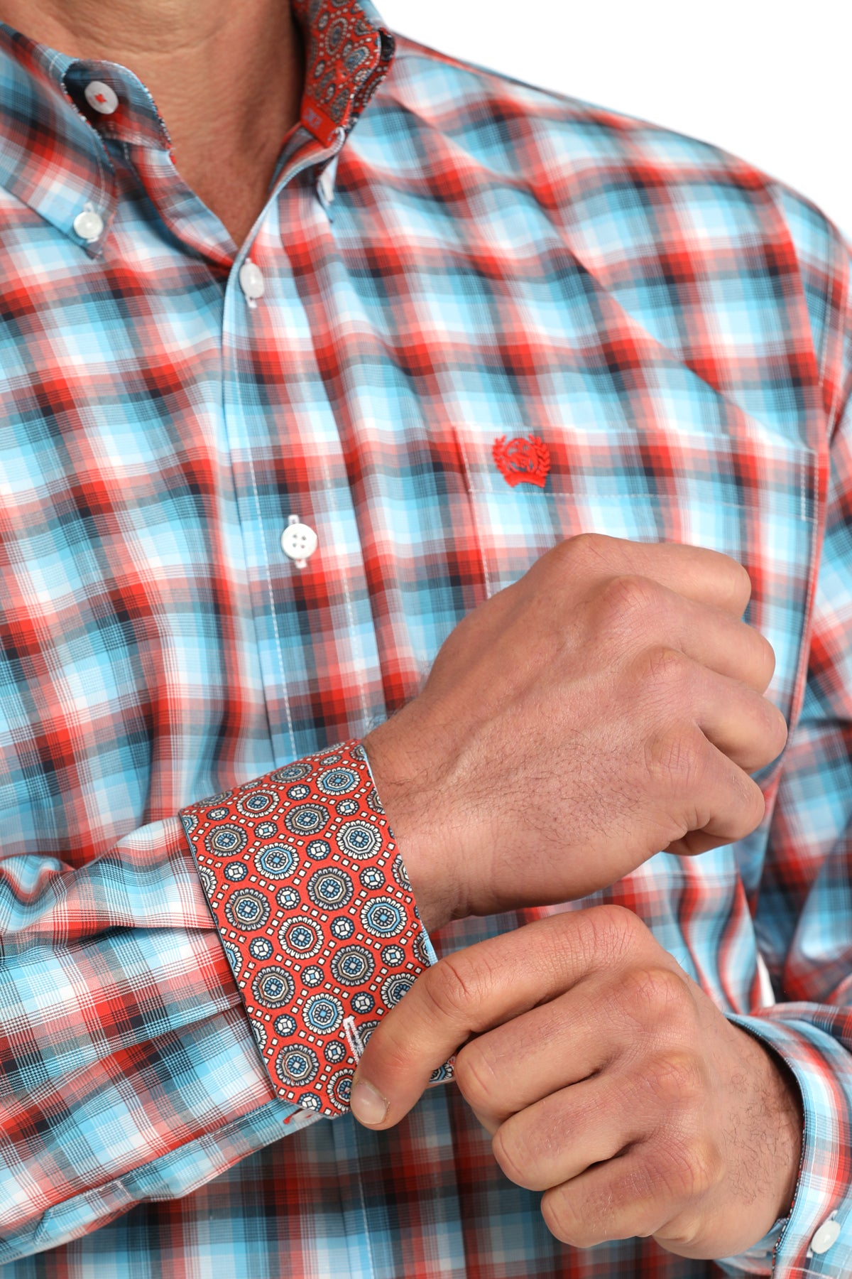 Man wearing a Cinch plaid shirt and jeans on a white background