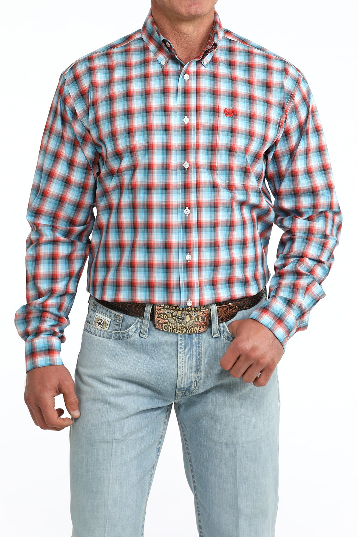 Man wearing a Cinch plaid shirt and jeans on a white background